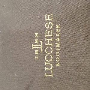 Navy Lucchese boot bag with draw strings top.